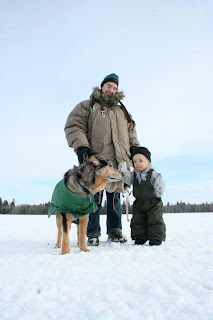 My toddler throwing a snowball for Quinoa, in her last week.