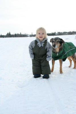 Quinoa playing in the snow with our toddler